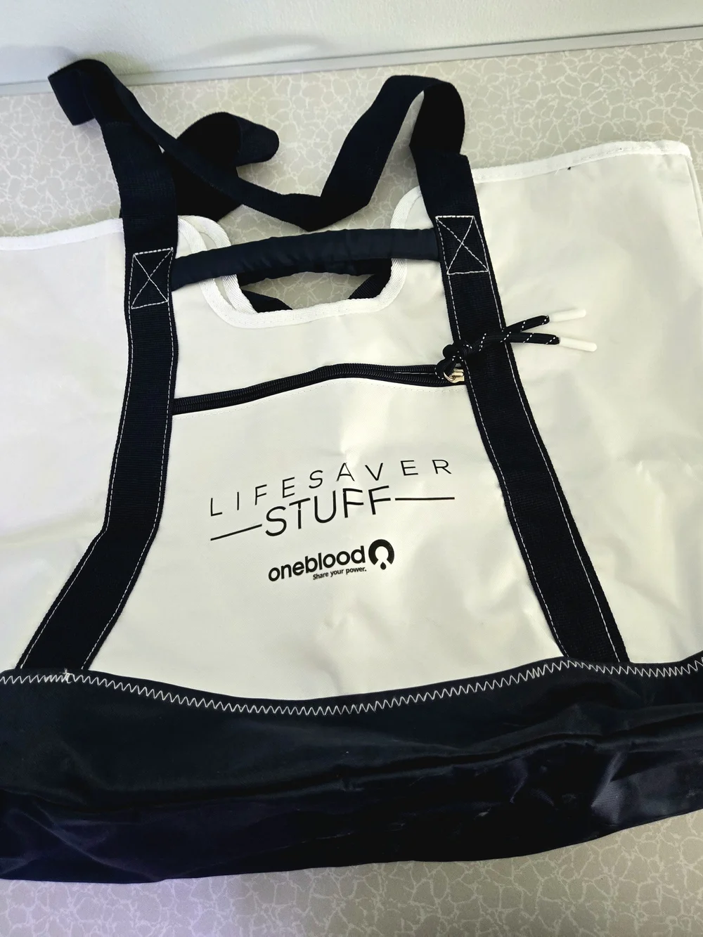 OneBlood Lifesaver Stuff White & Black Tote Bag